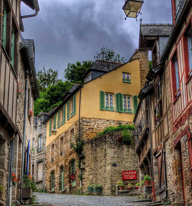 Old style lampposts on a cobbled street in Dinan, Brittany